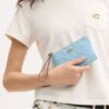 Bolsa de pulsera con cremallera en las esquinas en cuero exclusivo