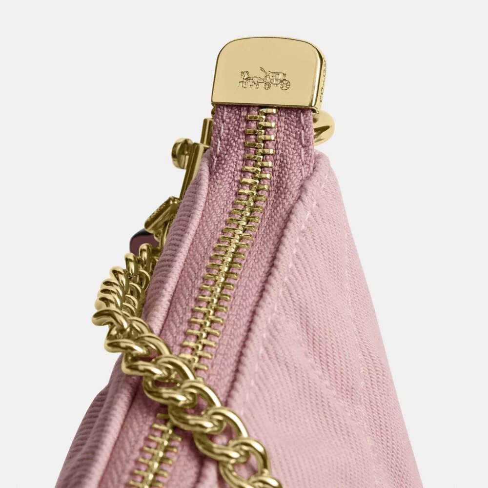 Bolso de hombro Caitlin de algodón regenerativo con acolchado y dije