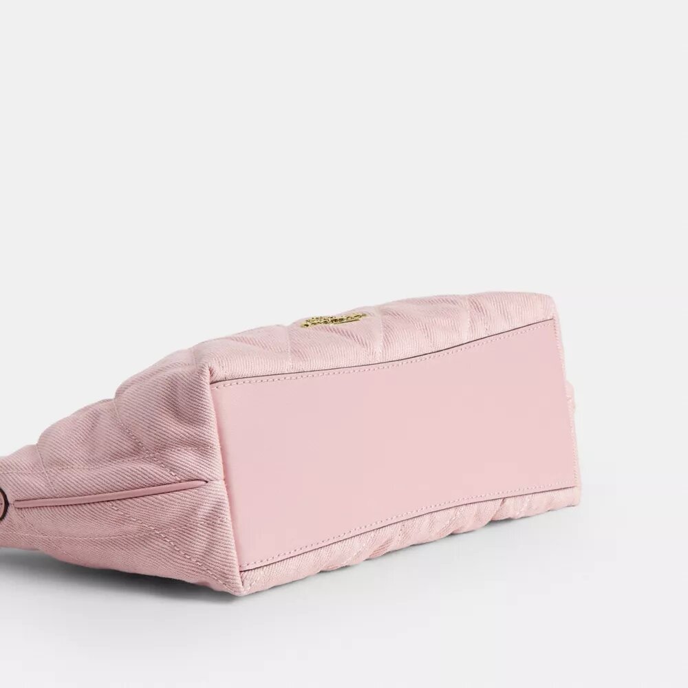 Bolso de hombro Caitlin de algodón regenerativo con acolchado y dije