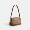 Bolso mini Carey de bandolera en Signature Canvas