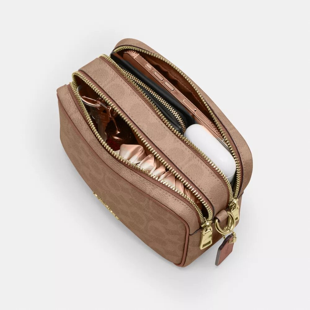 Bolso mini Carey de bandolera en Signature Canvas