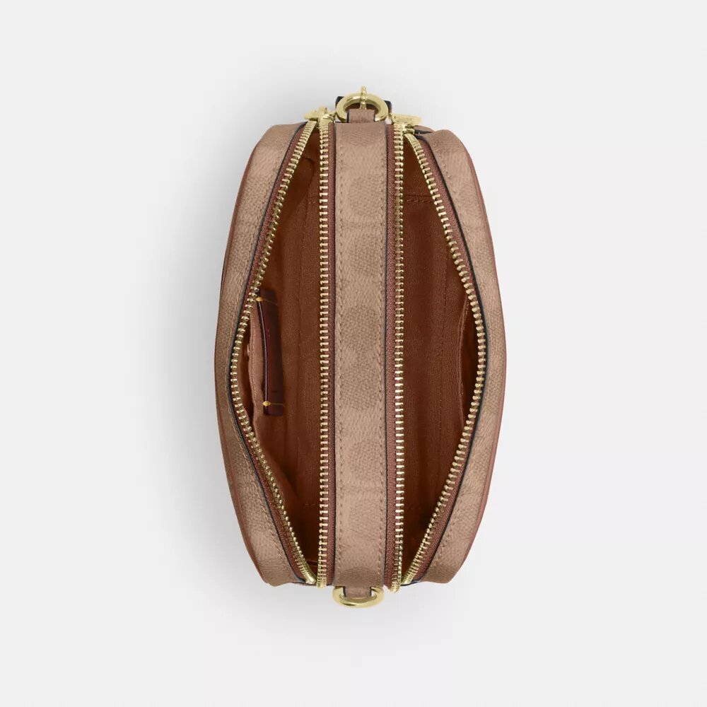 Bolso mini Carey de bandolera en Signature Canvas