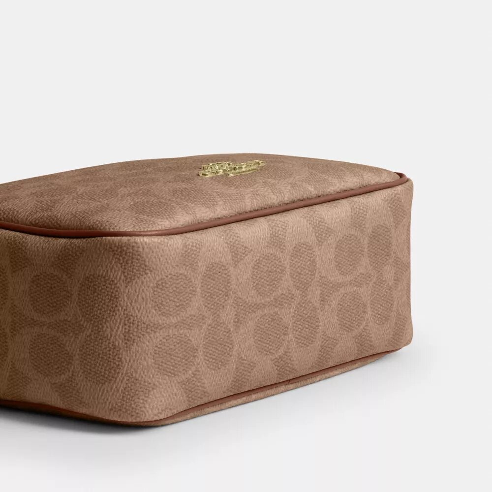 Bolso mini Carey de bandolera en Signature Canvas