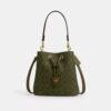 Bolso tipo cubeta Rowan en Signature Canvas