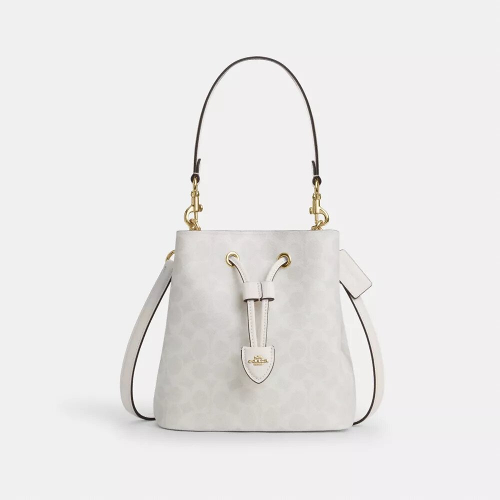 Bolso tipo cubeta Rowan en Signature Canvas