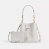 Bolso tipo cubeta Rowan en Signature Canvas