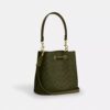 Bolso tipo cubeta Rowan en Signature Canvas
