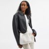 Bolso tipo cubeta Rowan en Signature Canvas