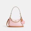Bolsos de hombro Teri en Signature Canvas con Charms