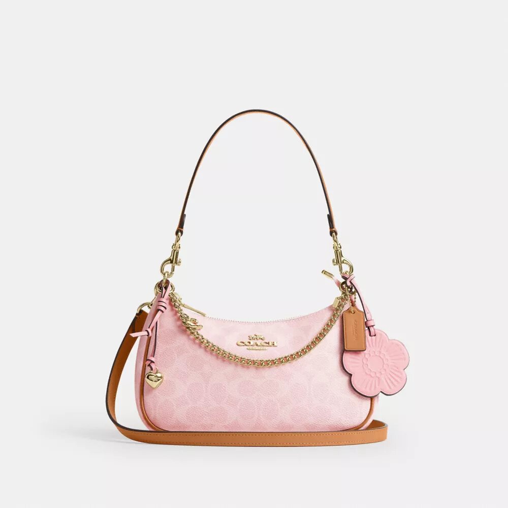 Bolsos de hombro Teri en Signature Canvas con Charms