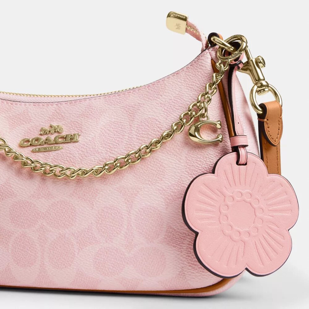 Bolsos de hombro Teri en Signature Canvas con Charms
