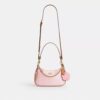 Bolsos de hombro Teri en Signature Canvas con Charms