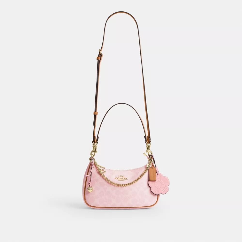 Bolsos de hombro Teri en Signature Canvas con Charms