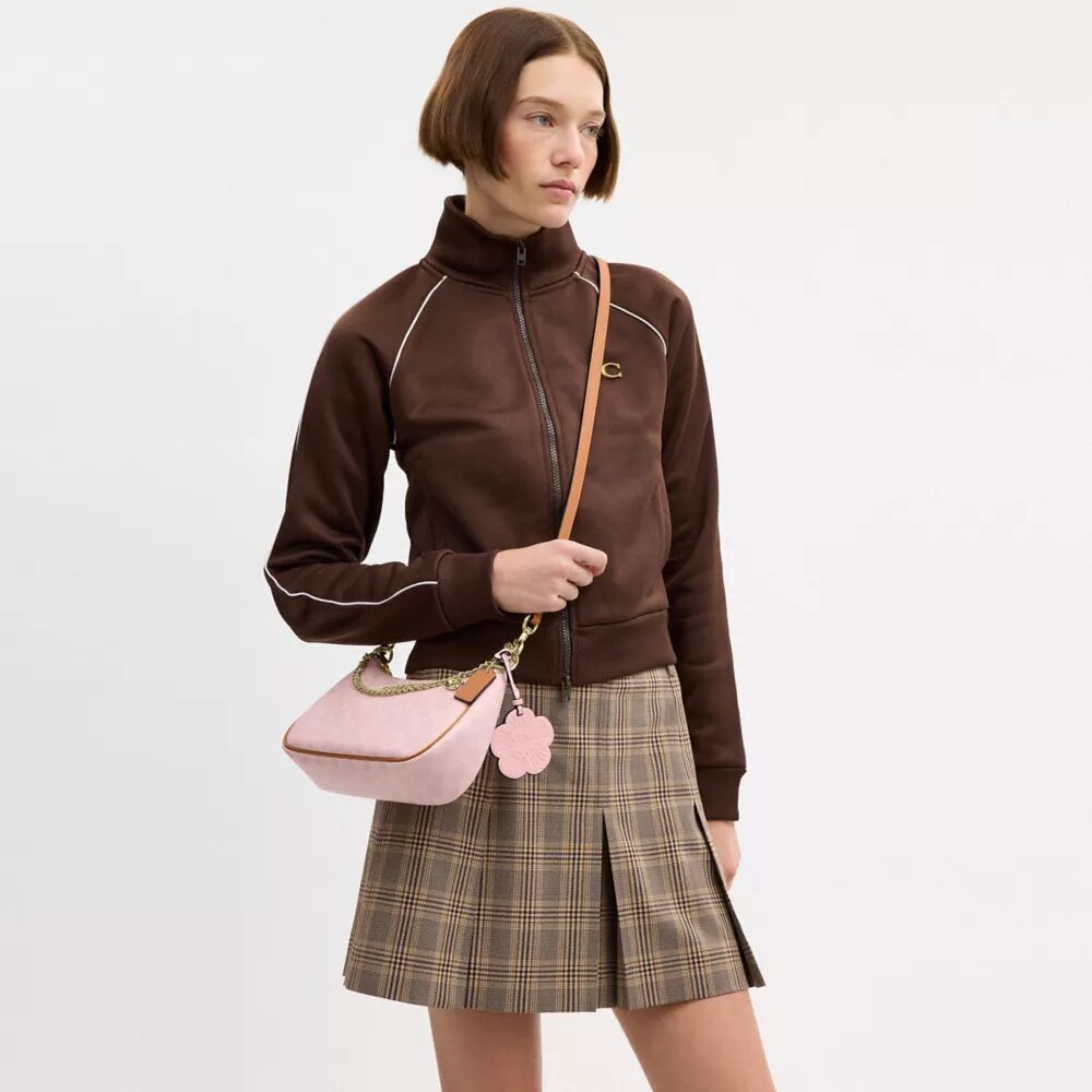 Bolsos de hombro Teri en Signature Canvas con Charms