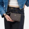 Bolsos de pulsera con cremallera en la esquina y acolchado
