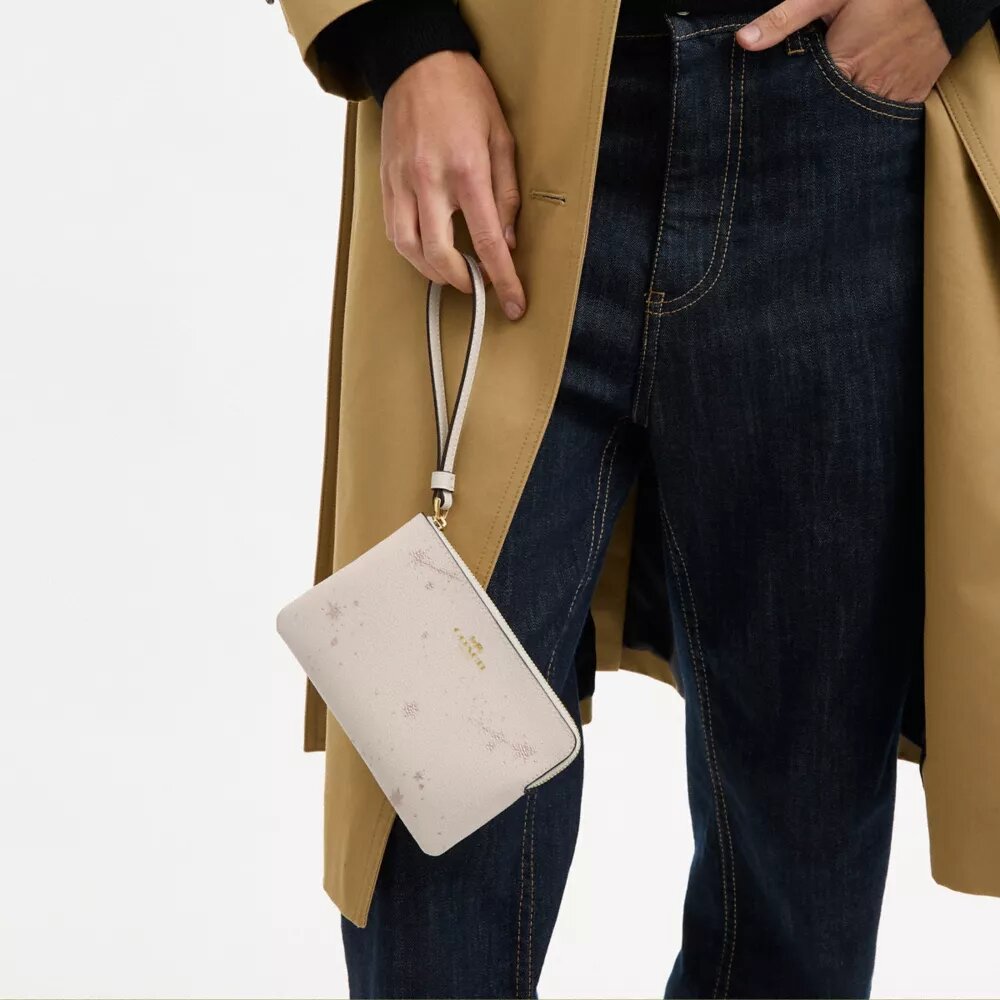Bolsos de pulsera con cremallera en la esquina y estampado de estrellas
