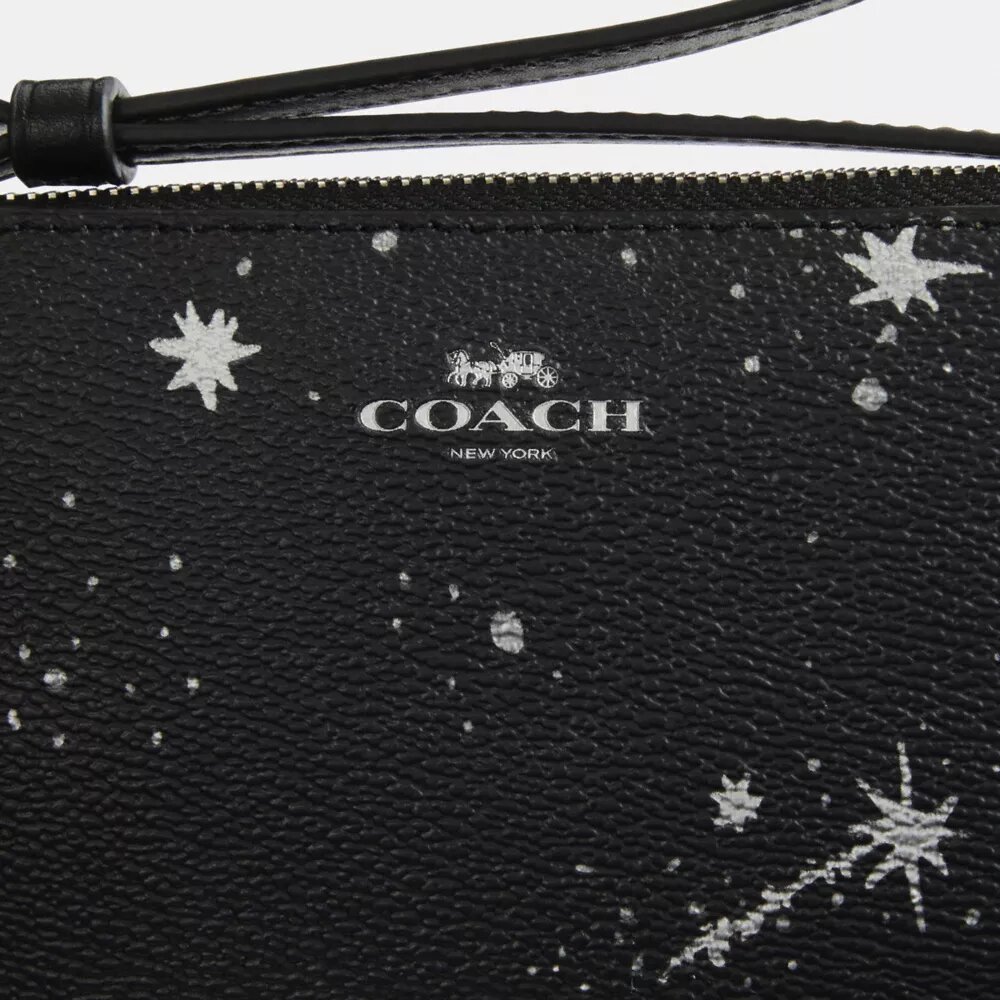 Bolsos de pulsera con cremallera en la esquina y estampado de estrellas