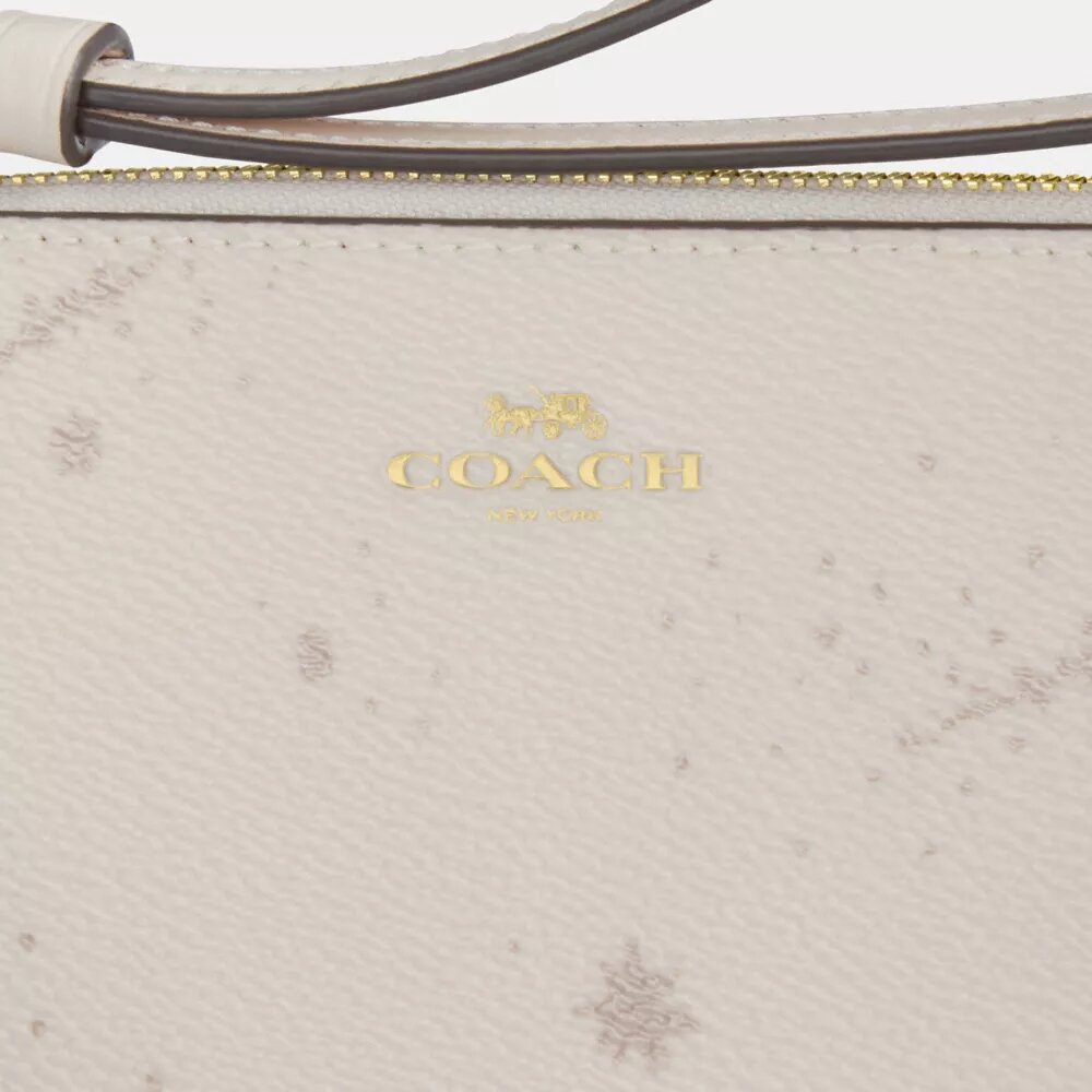 Bolsos de pulsera con cremallera en la esquina y estampado de estrellas