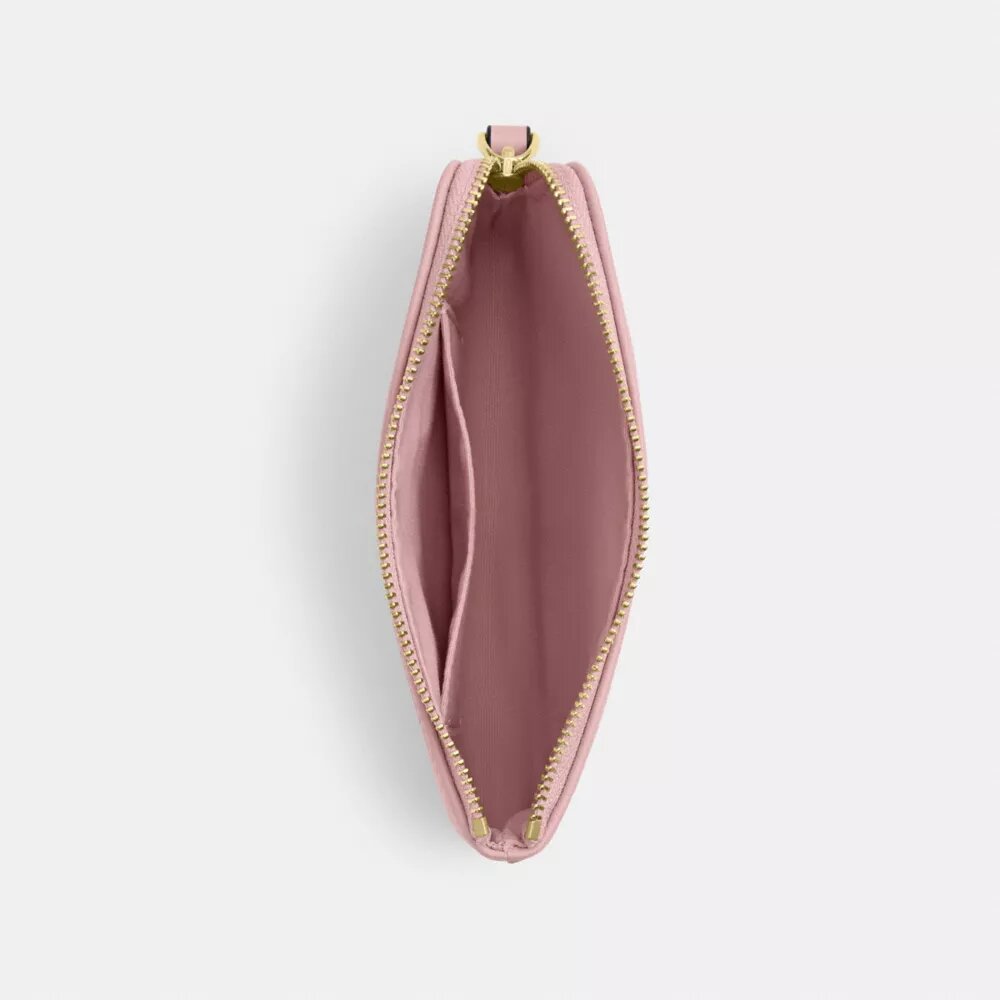 Bolsos de pulsera con cremallera en las esquinas en denim característico