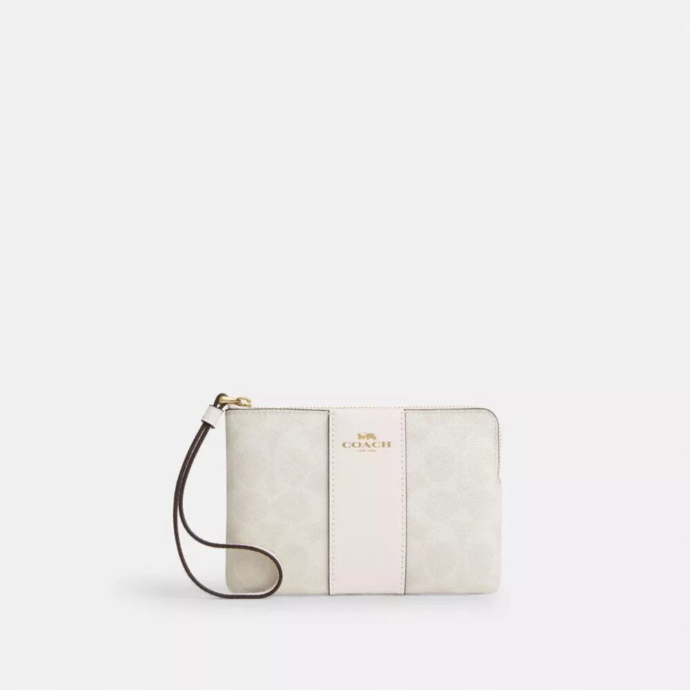 Bolsos de pulsera con cremallera en las esquinas en Signature Canvas con rayas