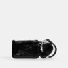 Bolsos de pulsera y neceser en forma de corazón con dije