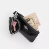Bolsos de pulsera y neceser en forma de corazón con dije