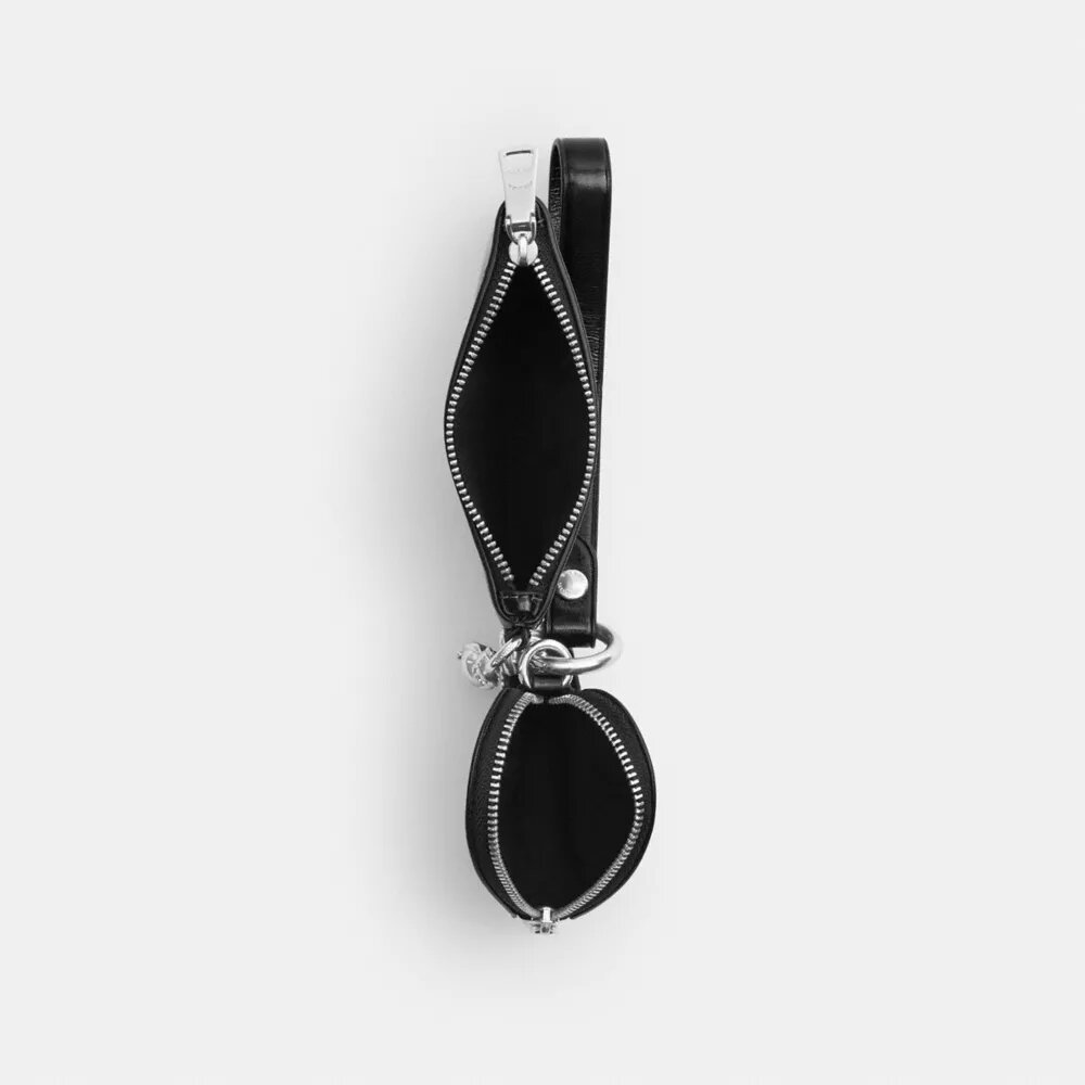 Bolsos de pulsera y neceser en forma de corazón con dije