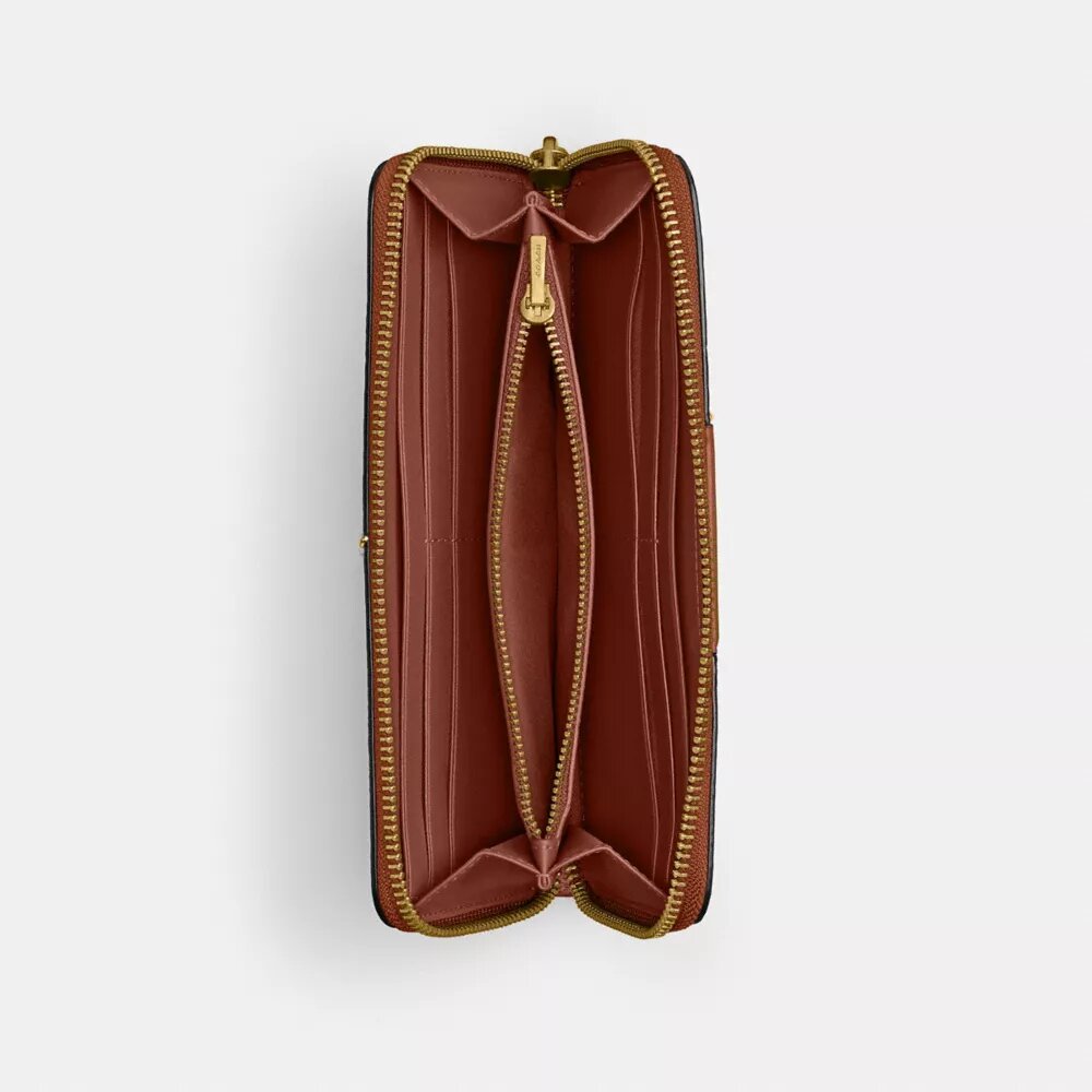 Cartera delgada tipo acordeón con cremallera Essential en Signature Canvas