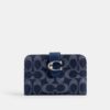 Cartera Tabby en denim exclusivo