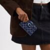 Cartera Tabby en denim exclusivo