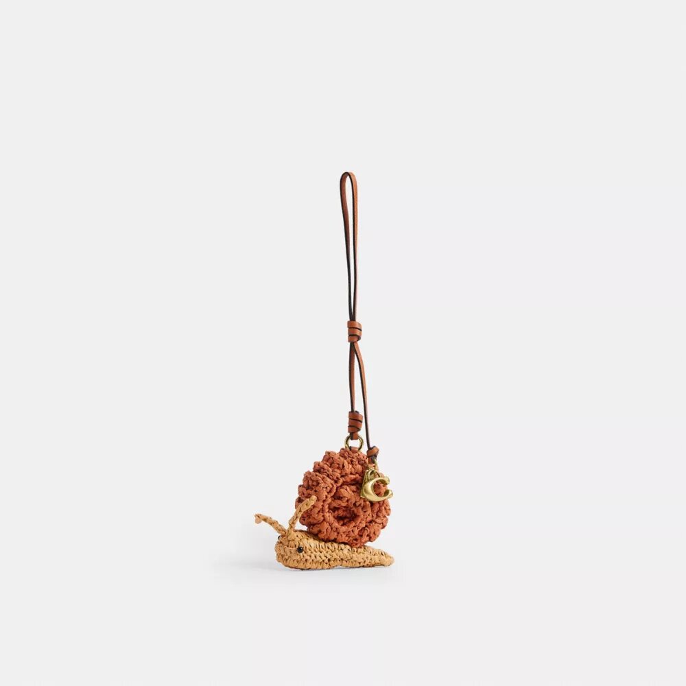 Colgante para bolso con forma de caracol