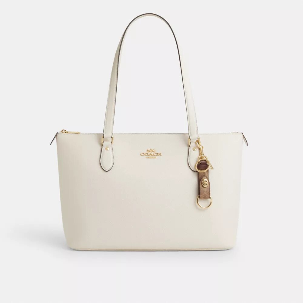 Colgante para bolsos con cierre de resorte en Signature Canvas