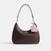 Colgante para bolsos en forma de corazón en cuero exclusivo con dije de corazón