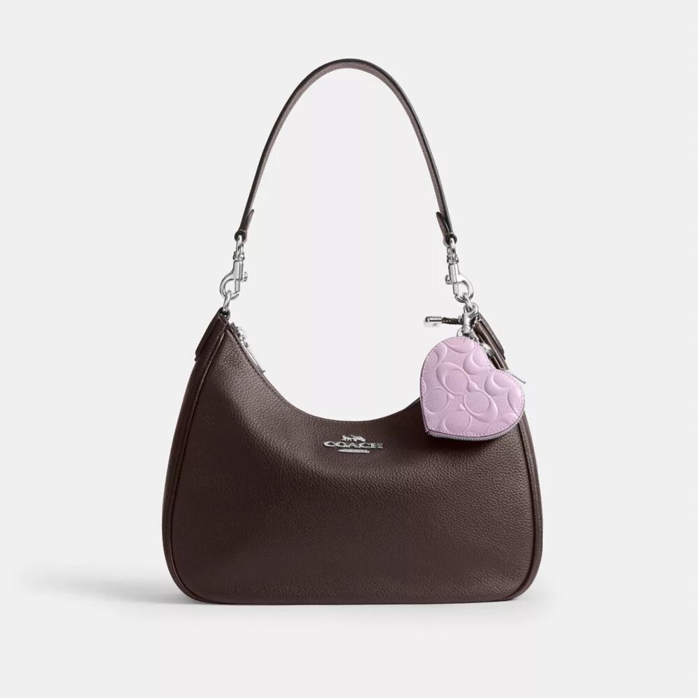 Colgante para bolsos en forma de corazón en cuero exclusivo con dije de corazón
