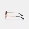 Gafas de sol redondas de metal con detalles en C