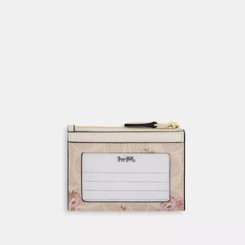 Mini estuche delgado para identificación en Signature Canvas con estampado floral
