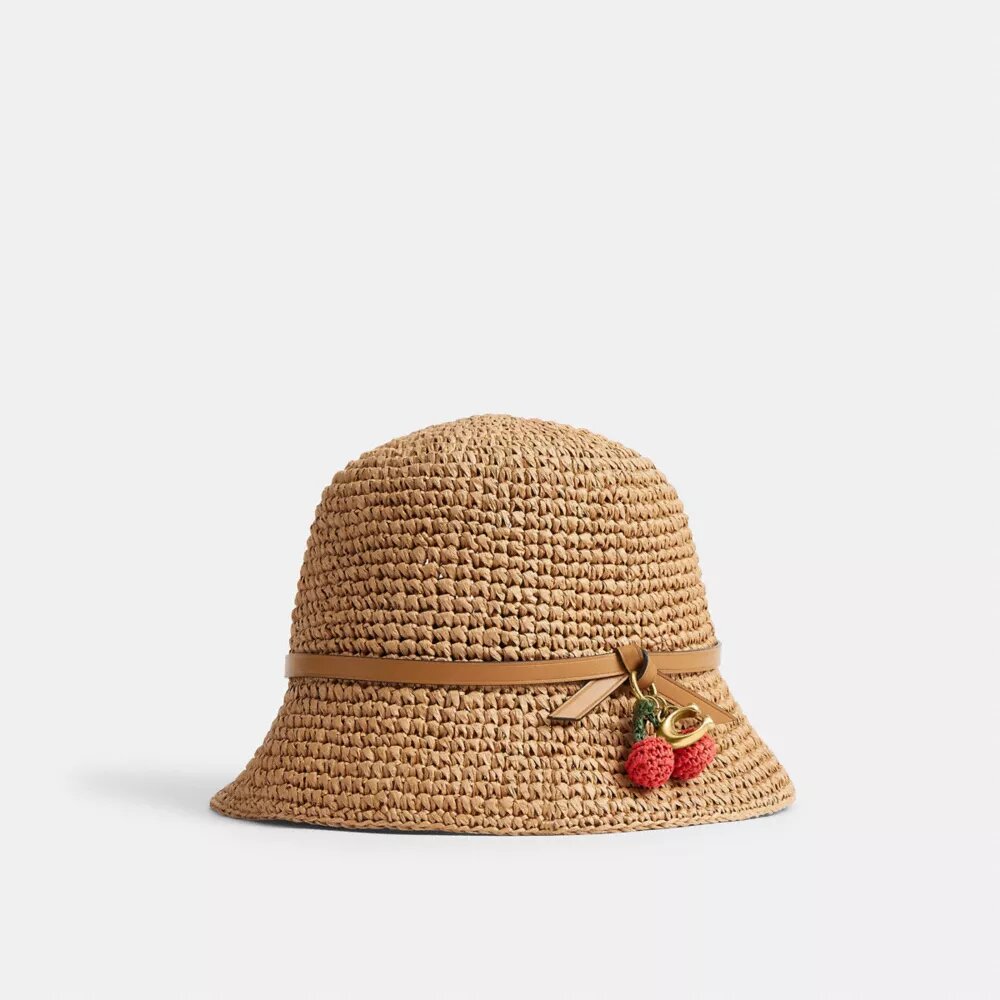 Sombrero de paja tipo bucket con detalle de cereza