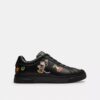 Zapatillas altas de Disney x Coach con estampado de calcomanías